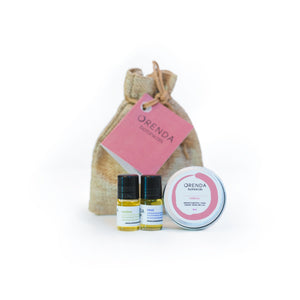 Orenda Botanicals Pink Trio Bag. Featuring mini-sized topical products, it's perfect for on-the-go people suffering from headaches, congestion, stress and dry skin. It includes the following 3 items:  1 Rest, 1 Revive, 1 Relieve